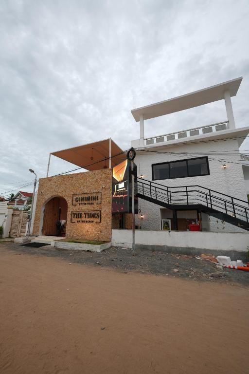 Building exterior with staircase to the suites
