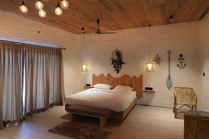Beach-themed suite with anchor decor and dreamcatcher